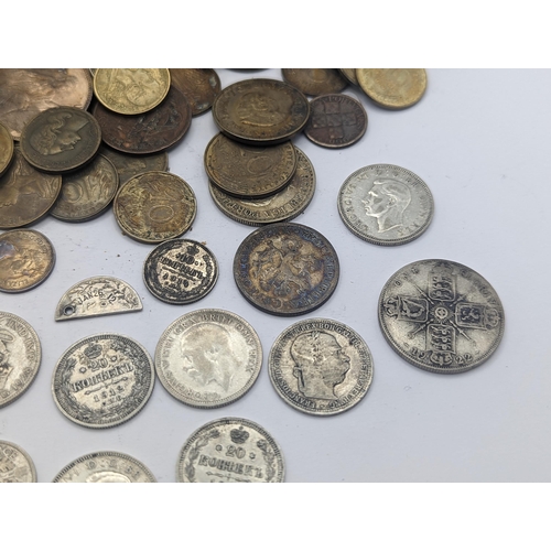 63 - A mixed British and world coins to include George V Shillings, mixed pennies and later examples, Fre... 