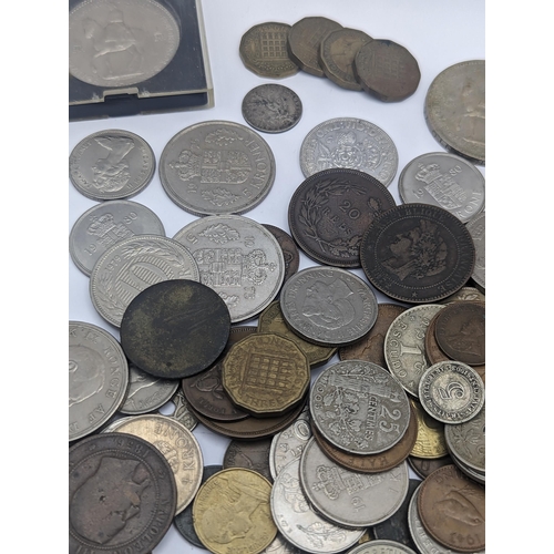 64 - A mixed collection of world coins to include a 1924 'Eagle' Dollar and later USA coins to include 19... 