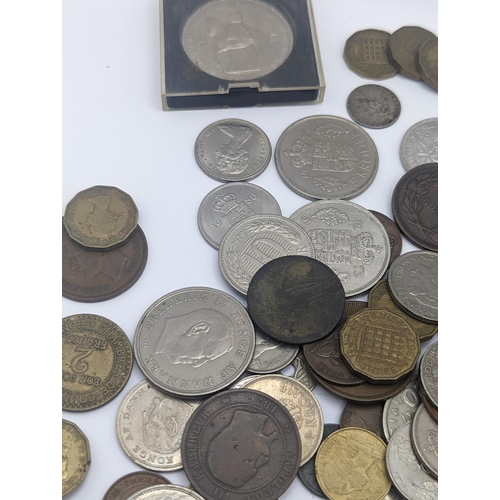 64 - A mixed collection of world coins to include a 1924 'Eagle' Dollar and later USA coins to include 19... 