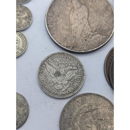 64 - A mixed collection of world coins to include a 1924 'Eagle' Dollar and later USA coins to include 19... 