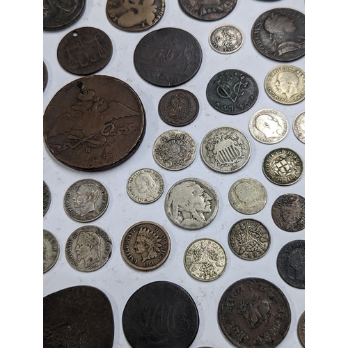 9 - A mixed collection of world coins to include William and Mary halfpenny, 1822 Irish halfpenny, 1822 ... 