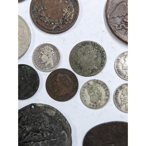 9 - A mixed collection of world coins to include William and Mary halfpenny, 1822 Irish halfpenny, 1822 ... 