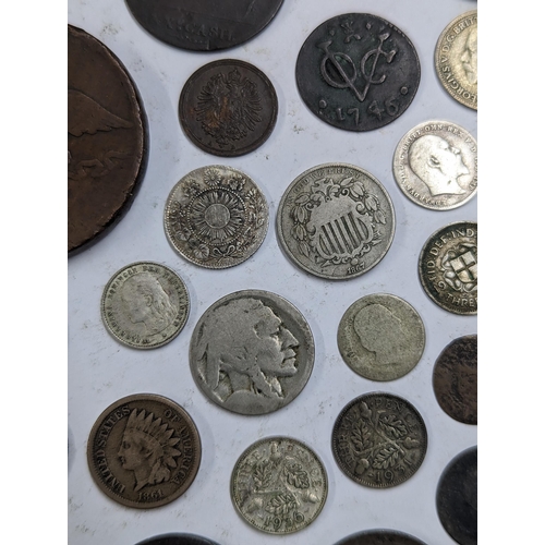 9 - A mixed collection of world coins to include William and Mary halfpenny, 1822 Irish halfpenny, 1822 ... 