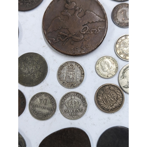 9 - A mixed collection of world coins to include William and Mary halfpenny, 1822 Irish halfpenny, 1822 ... 