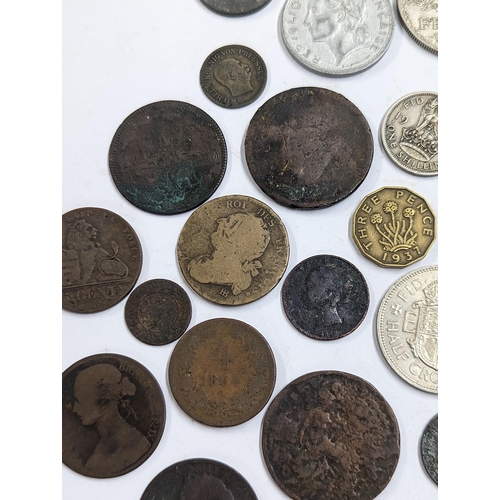 9 - A mixed collection of world coins to include William and Mary halfpenny, 1822 Irish halfpenny, 1822 ... 