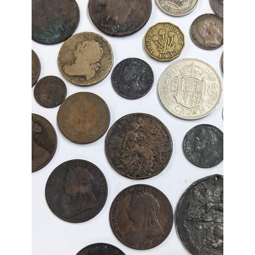 9 - A mixed collection of world coins to include William and Mary halfpenny, 1822 Irish halfpenny, 1822 ... 