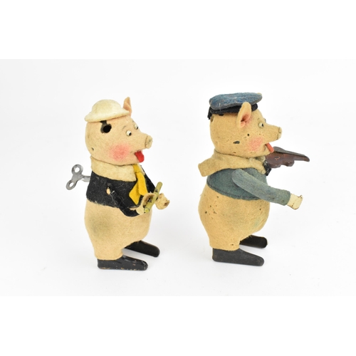 212 - Two Schuco clockwork Walt Disney’s Silly Symphony The Three Little Pigs, 1930s, pink felt covered ti... 