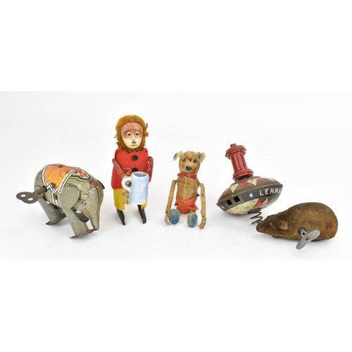 213 - A small collection of Schuco clockwork tinplate toys, early to mid 20th century, to include a monkey... 