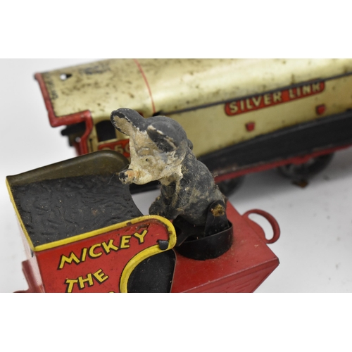 214 - A 1930s Wells Brimtoy Disney Mickey Mouse Circus Train set, with tinplate clockwork 0-4-0 loco in bl... 