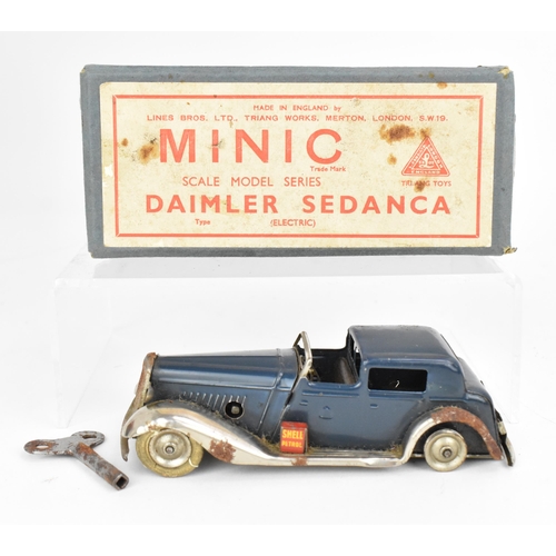 216 - A Tri-ang Minic tinplate clockwork Daimler Sedanca, in blue and steel colour, with original box and ... 