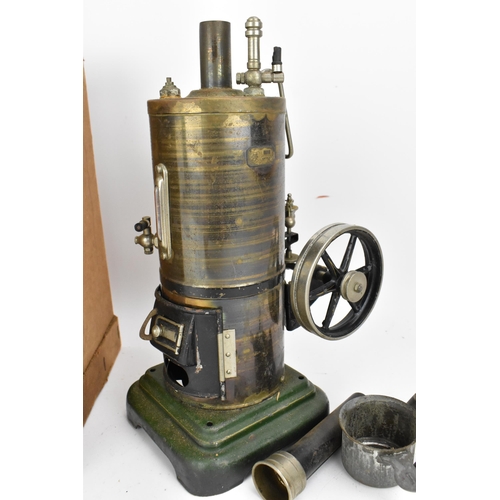 218 - An early 20th century Marklin live steam vertical engine, the boiler with single fixed upright cylin... 