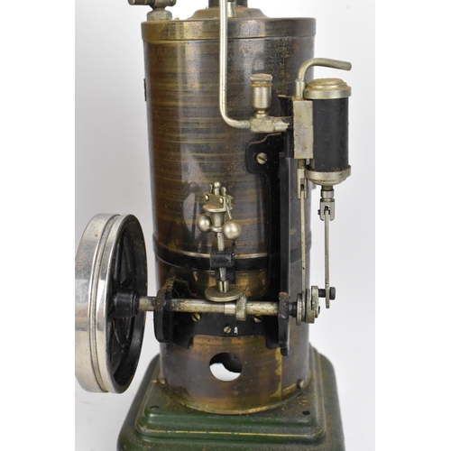 218 - An early 20th century Marklin live steam vertical engine, the boiler with single fixed upright cylin... 