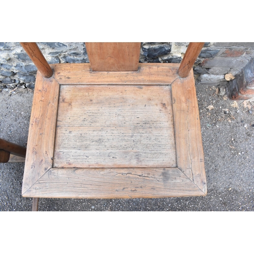 105 - A pair of Chinese yoke-back scholar chairs, possibly made from huanghuali wood, 18th century or earl... 