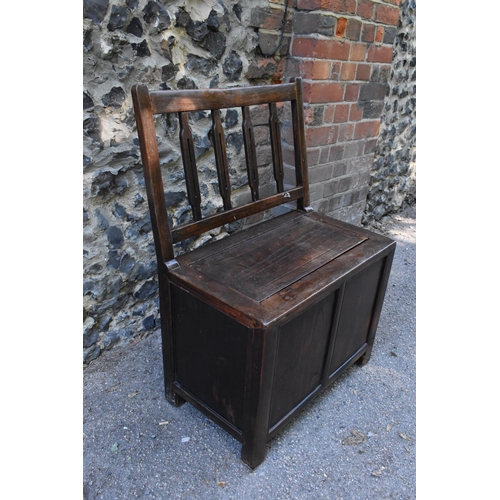 106 - A Chinese Qing dynasty seat, 19th century, probably hongmu wood, with privacy compartment under the ... 