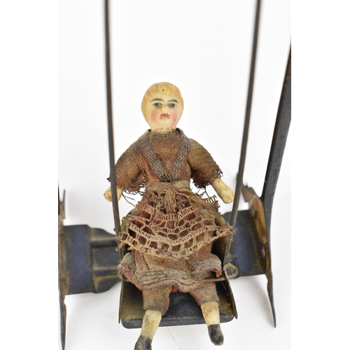 219 - A late Victorian miniature doll on swing toy by Ernst Paul Lehmann, circa 1894-1899, the porcelain h... 