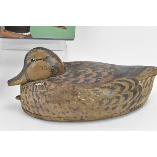 231 - Two carved and painted decoy ducks, 20th century, probably American, one of a hen mallard, together ... 