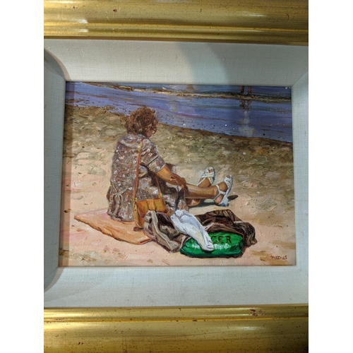 124 - Two oils on board by David Aldus in gold coloured frames, one depicting a lady sitting on a beach 24... 