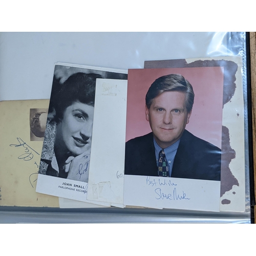 320 - A folder of signed postcards, photographs and photographic prints to include John Travolta, Bert Wee... 