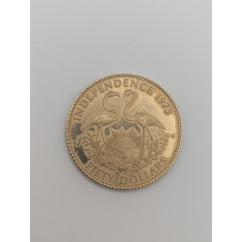 56 - Commonwealth of the Bahamas - Elizabeth II (1952-2022), 1973 'Independence' 12ct gold 50 dollars
Loc... 