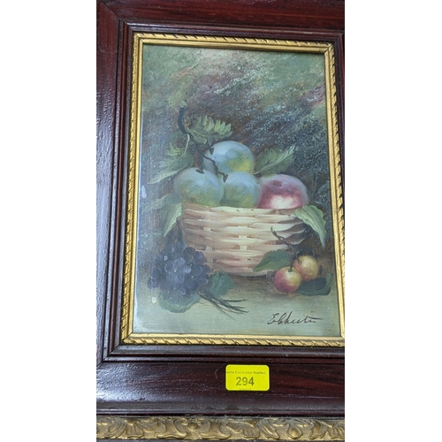 294 - A pair of oil paintings depicting still life scenes of fruit in a bowl, indistinctly signed, 29cm x ... 