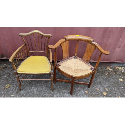 304 - Two chairs to include a 19th century rush seated corner armchair and an early 20th century bedroom c... 