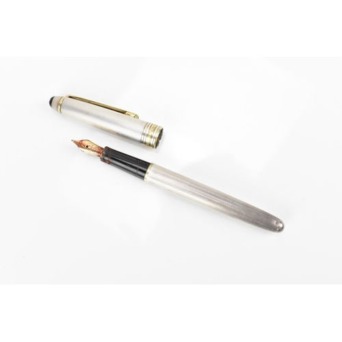 90 - A Montblanc Meisterstuck sterling silver barleycorn fountain pen, pre-1990, with 14k nib, gilt clip ... 