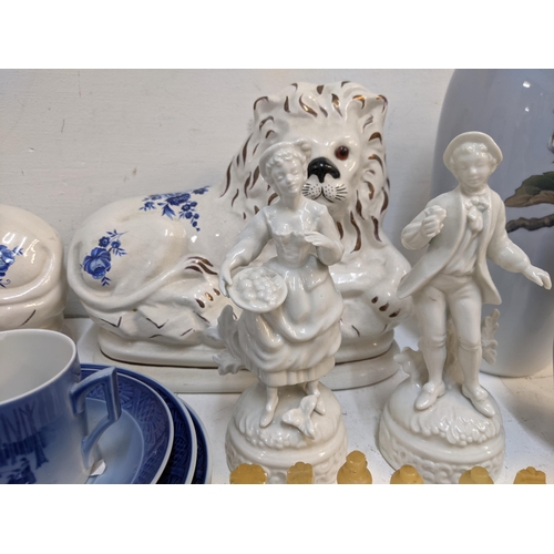 318 - Ceramics to include Royal Copenhagen vases, trinket box, seated deer, a pair of Deby figures and a C... 