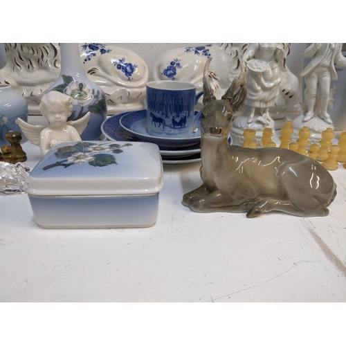 318 - Ceramics to include Royal Copenhagen vases, trinket box, seated deer, a pair of Deby figures and a C... 