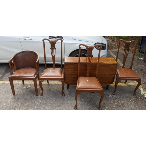 328 - An early 19th century mahogany gateleg table together with three pierced splat back chairs and a tub... 