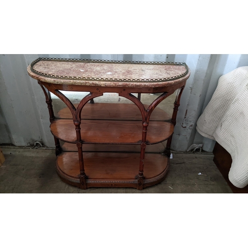 329 - A pine and marble topped side table having a brass gallery top, mirrored back and two open shelves 7... 