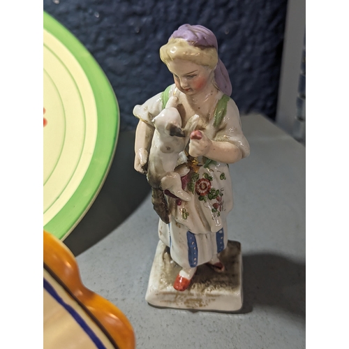 361 - Mixed ceramics to include a pair of porcelain figures stamped to bases, a floral painted wall hangin... 