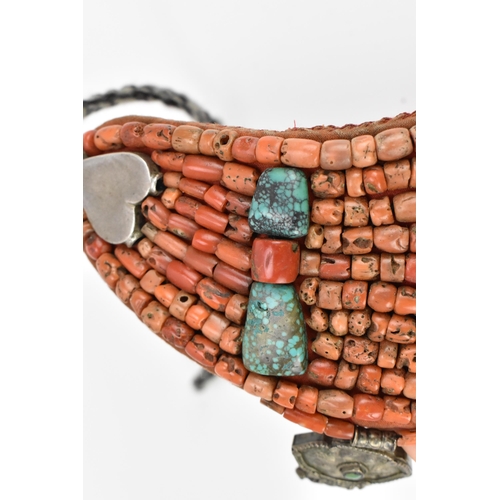 112 - A Tibetan or Nepalese coral, turquoise and white metal bib necklace, late 19th/early 20th century, w... 