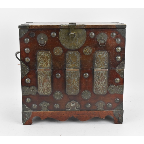 115 - A Korean iron clad table cabinet, late 19th/early 20th century, Joseon dynasty, with hinged fall fro... 