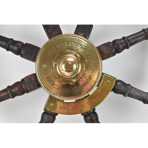 223 - A large oak and brass ships wheel removed from HMS Royal Sovereign, the brass hub reading 'Brown Bro... 