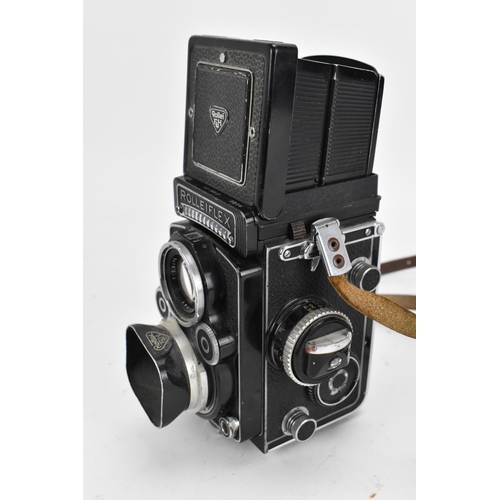 233 - A Rollei Rolleiflex 3.5F Medium Format TLR Camera, black, serial no 2805127, together with a Rollei ... 