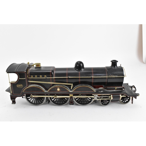 241 - An electric gauge 0 4-6-0 locomotive and tender Great Central, lined black no. 1097, with gilt lette... 