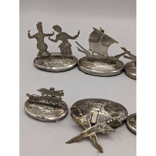 390 - A set of eight white metal South East Asian place name/menu card holders
Location:CAB