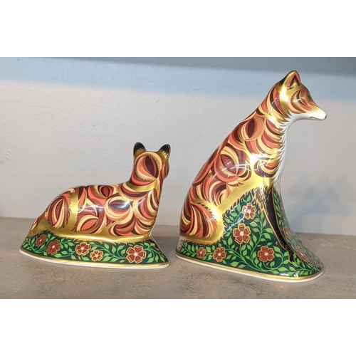 101 - A pair of Royal Crown Derby paperweights to include Devonian Vixen, together with Devonian fox club ... 