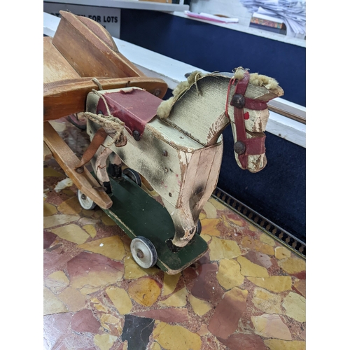 103 - A 1940's child's treen painted model of a horse and cart
Location:A1F