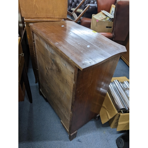 105 - A late 19th early 20th century French walnut cabinet having mother of pearl escutcheons and a front ... 