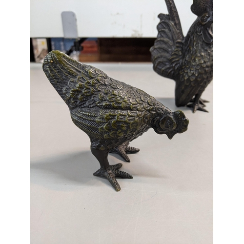 107 - Three bronze ornaments to include a cockerill together with a chicken and one other
Location:A4M