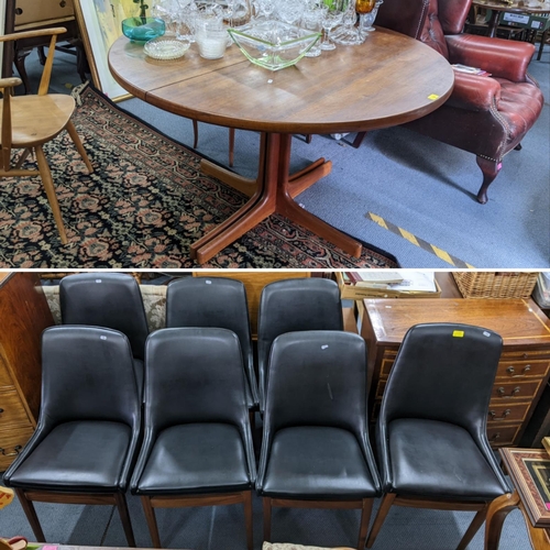 114 - A set of eight retro black vinyl and teak dinning chairs possibly by Burgess together with a teak ex... 