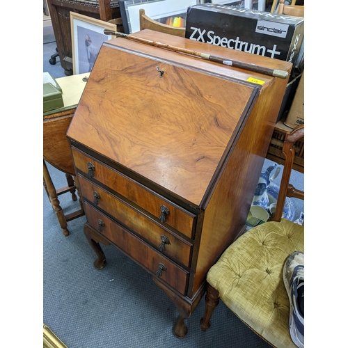 115 - An early 20th century Queen Anne style bureau 98h x 55.5w together with a riding crop
Location:A1F