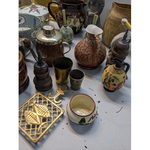 116 - A mixed lot to include an oak tea canister, mixed studio pottery, Goebel stark and other items 
Loca... 