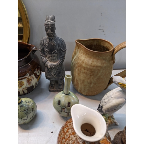 116 - A mixed lot to include an oak tea canister, mixed studio pottery, Goebel stark and other items 
Loca... 