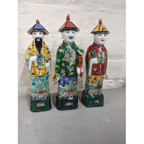 123 - Three Chinese porcelain polychrome enamel immortal figures
Location:LAF