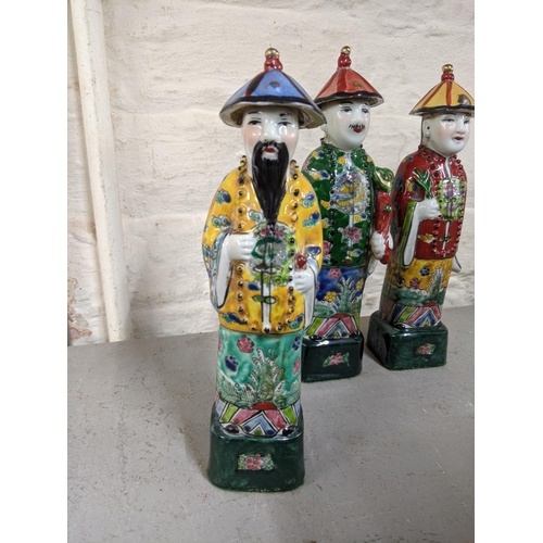 123 - Three Chinese porcelain polychrome enamel immortal figures
Location:LAF