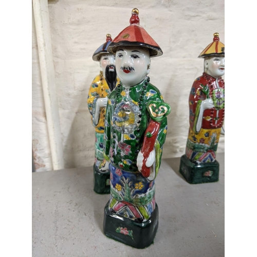 123 - Three Chinese porcelain polychrome enamel immortal figures
Location:LAF