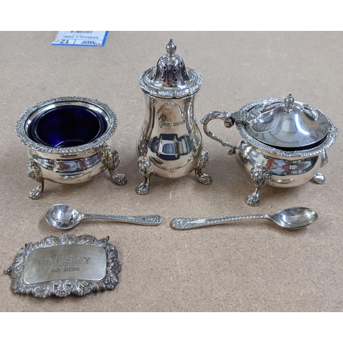 330 - Silver items to include a pair of salts and spoons, a pepper shaker, a decanter label 'Whisky' and a... 