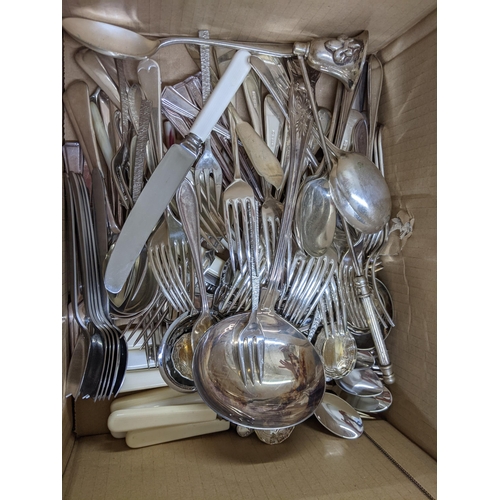 335 - Silver plated cutlery to include a soup ladle, a candle snuffer, knives, forks and spoons, some case... 